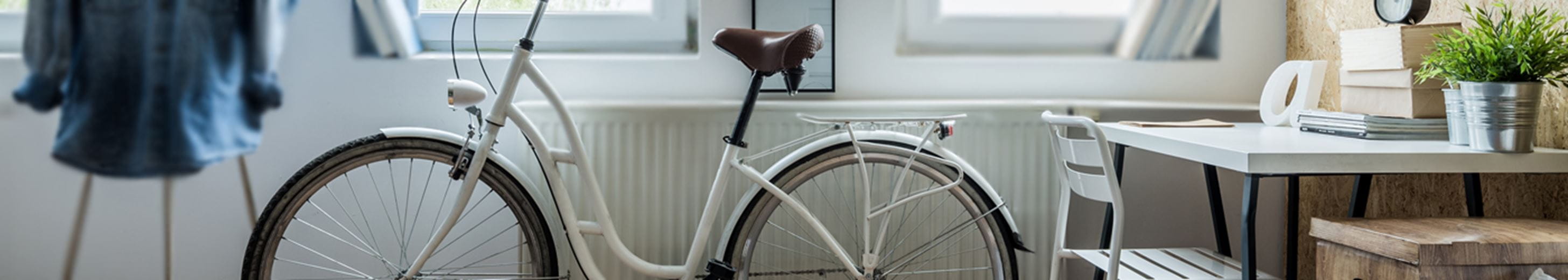 A bicycle next to a radiator