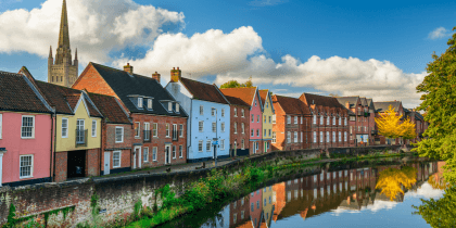 Quay Side architecture reflected in River Wensum. Norwich, Norfolk. England