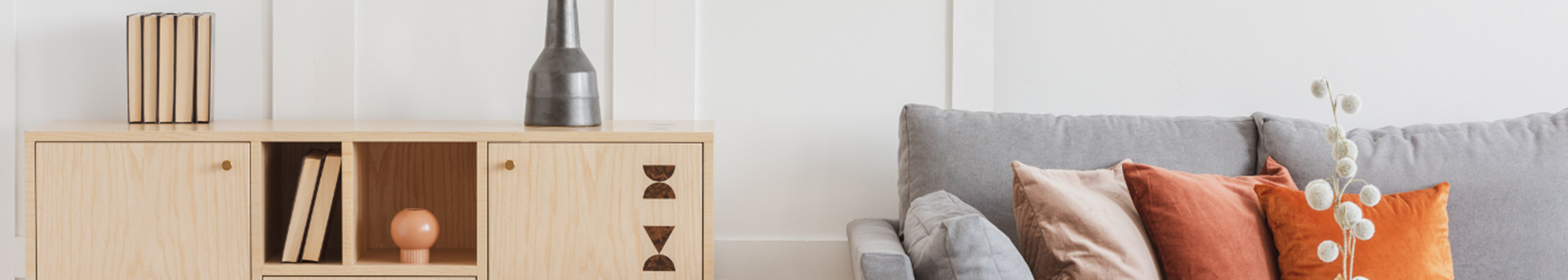 Organised cabinet next to sofa