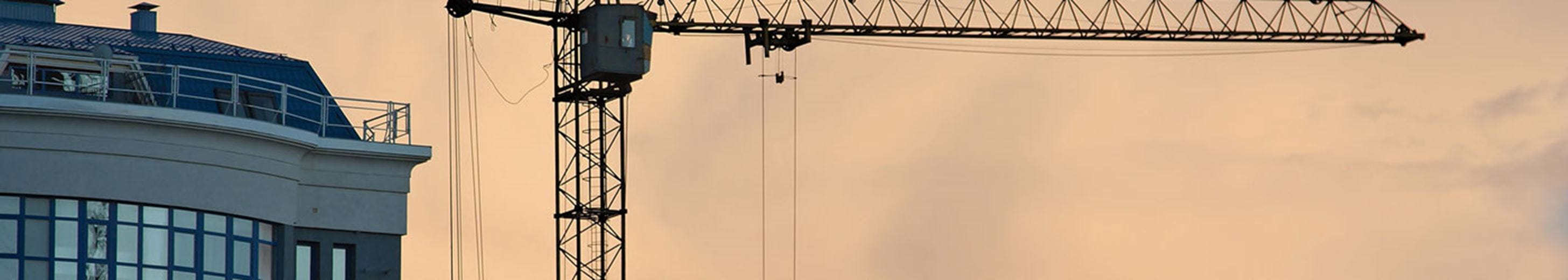 Commercial crane at sunset