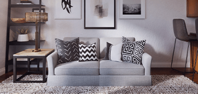 Grey sofa in a well decorated room